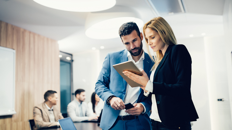 Business colleagues having meeting in conference room